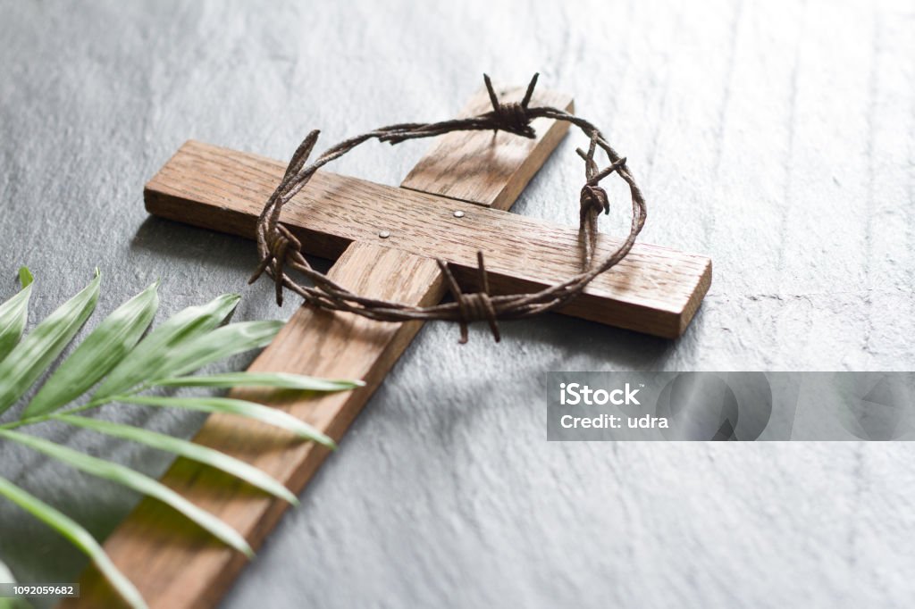 Easter wooden cross on black marble background religion abstract palm sunday concept Easter wooden cross on black marble background religion abstract palm sunday concept closeup Easter Stock Photo