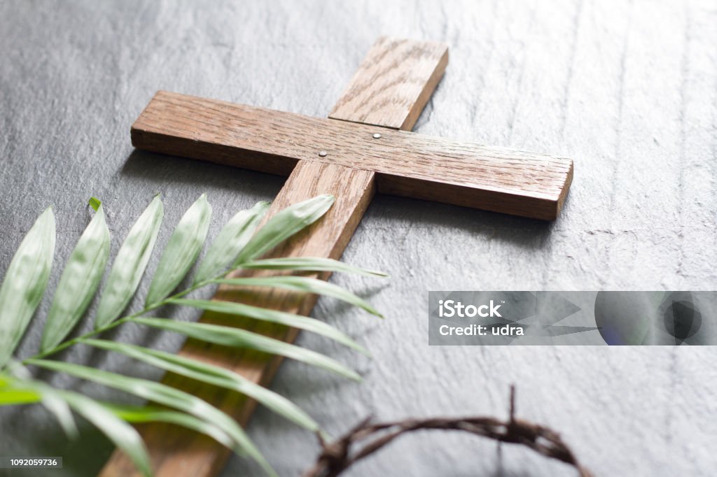 Easter wooden cross on black marble background religion abstract palm sunday concept Easter wooden cross on black marble background religion abstract palm sunday concept closeup Easter Stock Photo