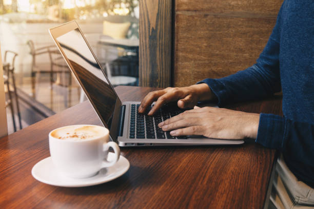 istock Young business man working at a coffee shop with a laptop. 1092062954