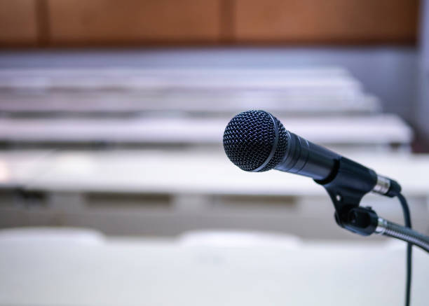 istock Microphone in Conference Seminar room Meeting Event Background 1092065458