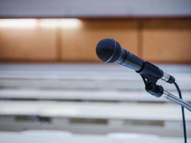 istock Microphone in Conference Seminar room Meeting Event Background 1092066494