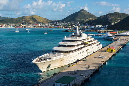 Philipsburg, St. Maarten - December 17, 2018: Private white luxury motor Superyacht Eclipse moored in Caribbean island of Sint Maarten - Saint Martin.