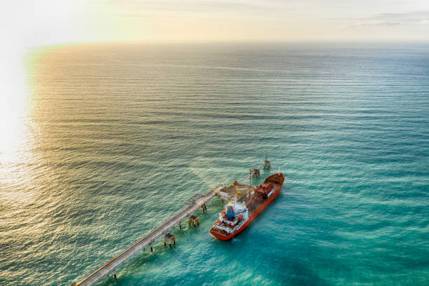 Aerial view of chemical tanker waiting for loading Aerial view of chemical tanker waiting for loading moored photos stock pictures, royalty-free photos & images