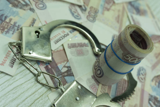 istock Bribe money and handcuffs violator maffia prison, 1092071794