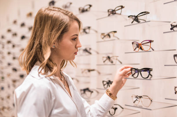 istock Young woman shopping for eyeglasses. 1092072052