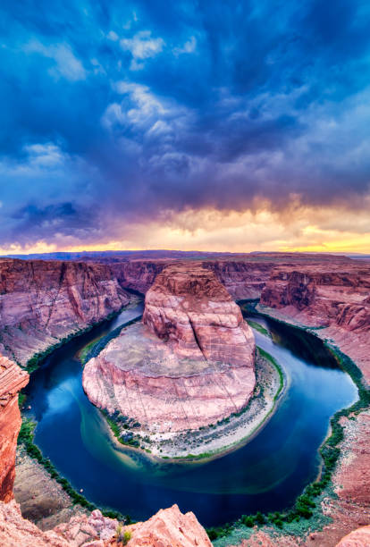 istock Horseshoe Bend on Colorado River at Sunset with Dramatic Cloudy Sky, Utah 1092077366