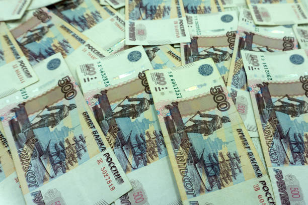 istock Heap of five thousand russian rubles banknotes as background . 1092080710