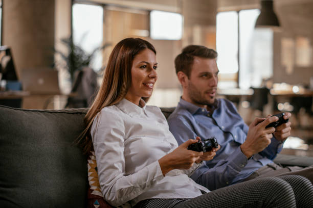istock Couple playing video games 1092080742