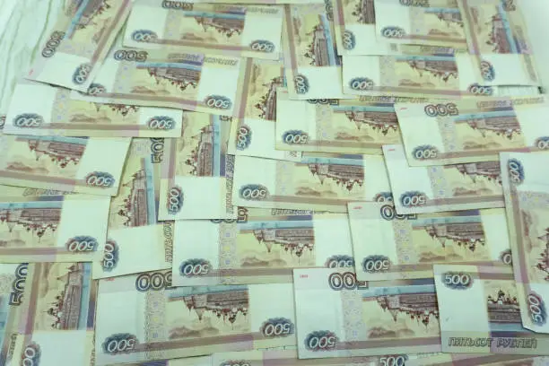 A heaps of banknotes in denominations of 500 rubles