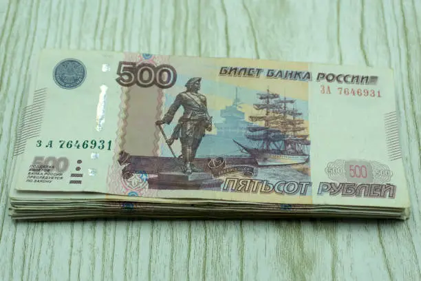 A stack of money in denominations of 500 rubles