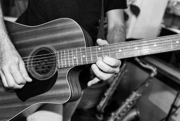 istock The guitarist plays a solo in the studio 1092083320