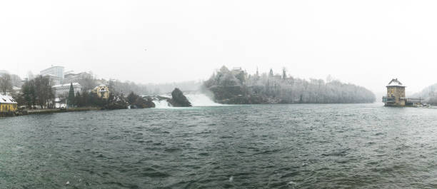 istock Rhine Falls in Switzerland on a winter day with snow falling 1092084194