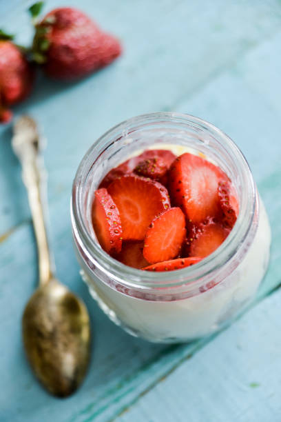 istock Dessert in a jar: strawberry with cream and biscuit 1092087286