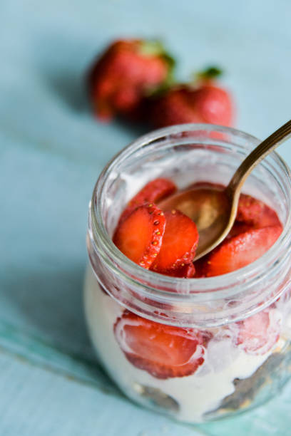 istock Dessert in a jar: strawberry with cream and biscuit 1092087298