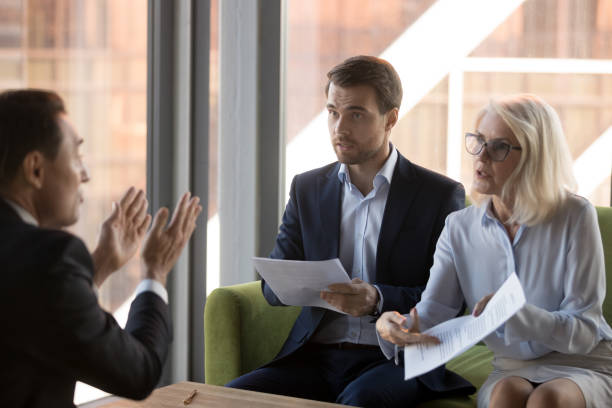 istock Angry financier director pointing on document showing it to colleague 1092087548