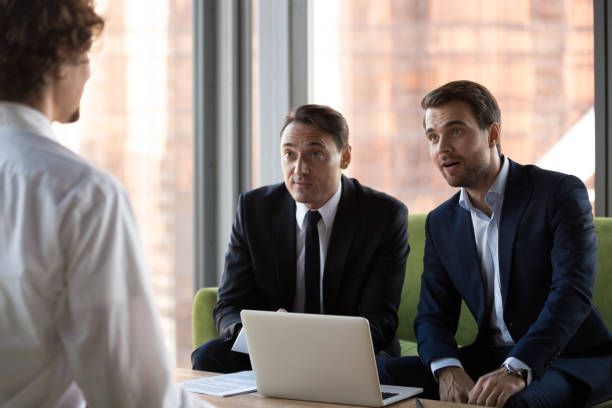 istock Surprised HR managers looking at job candidate 1092087672