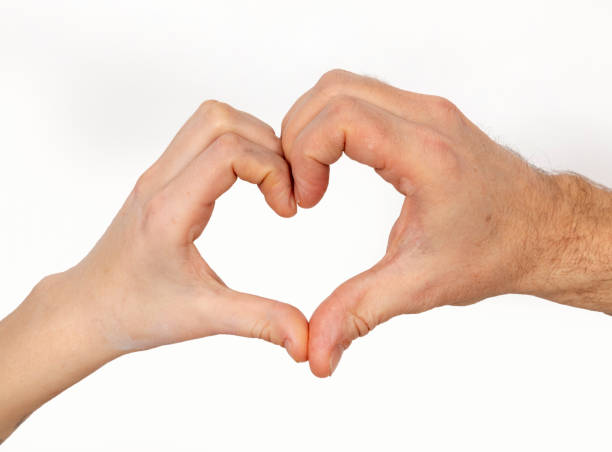 istock finger showing heart as love sign 1092095824