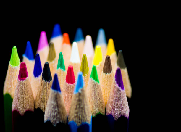 istock Color pencils in black background 1092096376