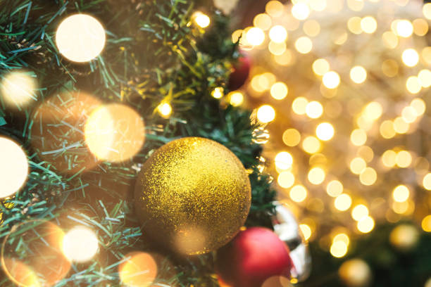 istock Golden and red balls on a Christmas tree with garlands 1092097356