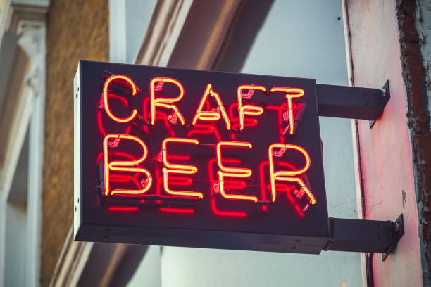 Neon sign for craft beer Neon sign for craft beer in East London craft beer photos stock pictures, royalty-free photos & images
