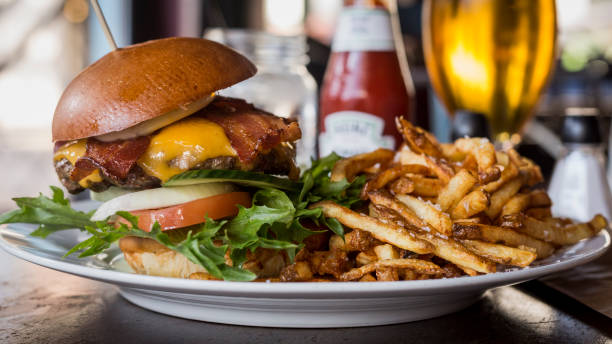 istock Juicy american hamburger with cheese, grilled ground meat, toppings 1092100144