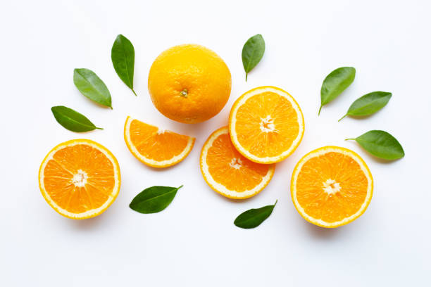 istock Fresh orange citrus fruit with leaves on white. 1092101392