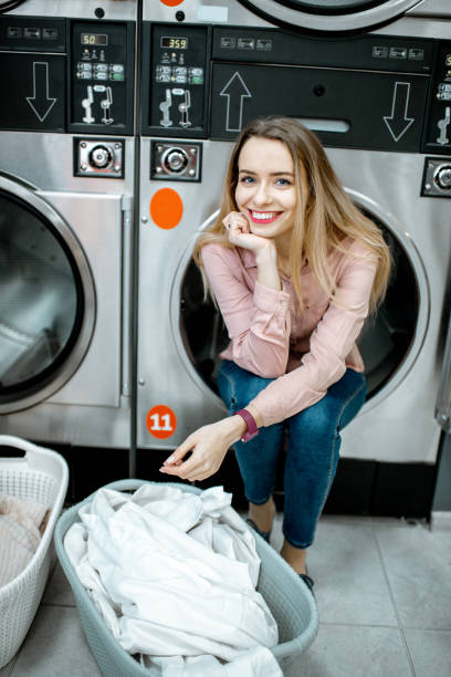 istock Woman in the laundry 1092104390