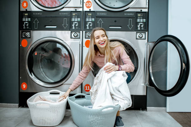 istock Woman sorting clothes in the laundry 1092104420