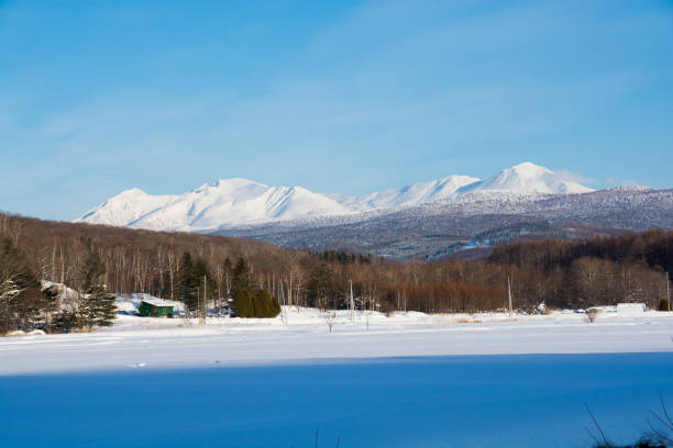 istock Blue sky and snow mountain in winter.Mt.Daisetuzan 1092107698