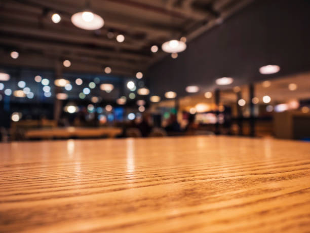 Table top Counter Blur lighting Bar Restaurant Shop interior background Table top Wooden Counter Blur lighting Bar Restaurant Shop interior background wine bar counter stock pictures, royalty-free photos & images
