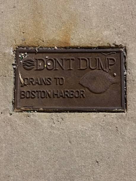 istock Don’t Dump Drains to Boston Harbor Manhole Cover 1092110460