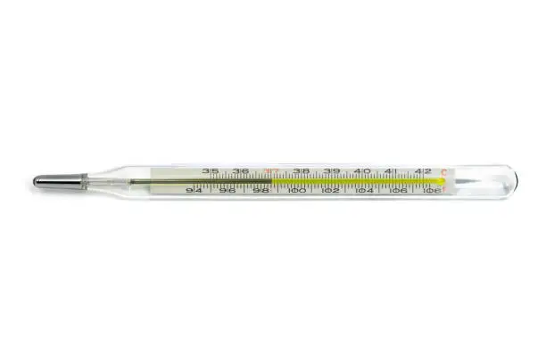 Photo of The oral thermometer on the white background.