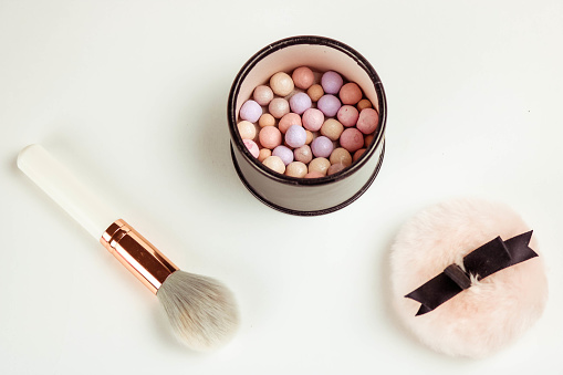 Pattern of make-up kit: brushes, meteorite powder and blusher