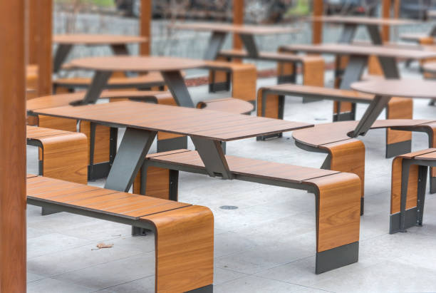 istock Public restaurant modern design wooden table and chairs for eating or drinking 1092115188