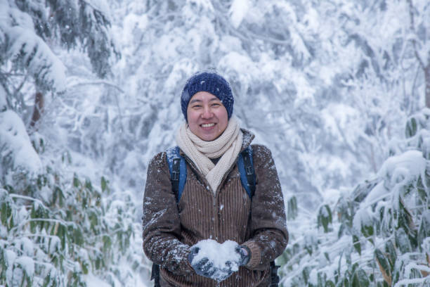 istock Happy man with snow world 1092118642
