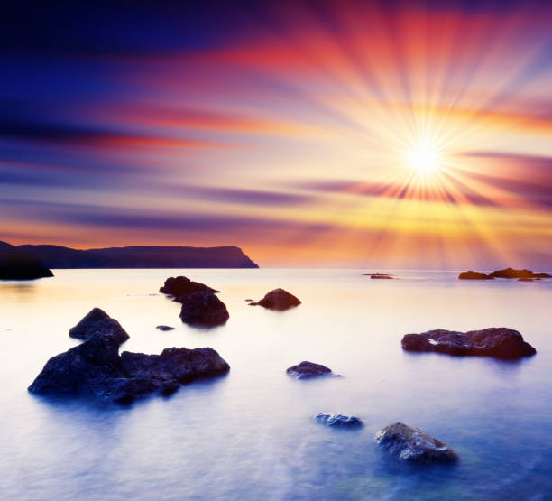 istock Beautiful sea and clouds sky with sun 1092122328