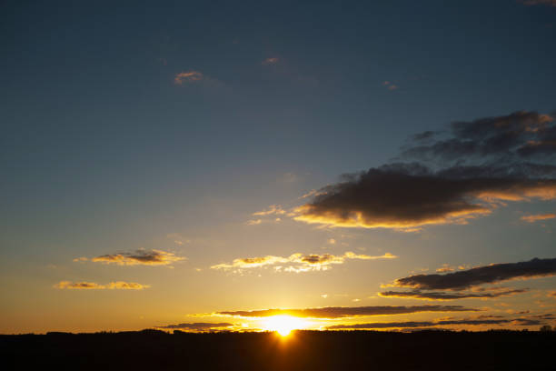 istock Sunset sky background. Landscape and dramatic sunset or sunrise sky in summer. 1092122360