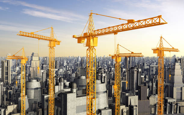 istock Construction cranes in front of skyscrapers 1092126234
