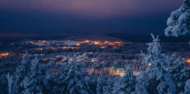 istock View over the small mountain settlement in the winter night 1092129812