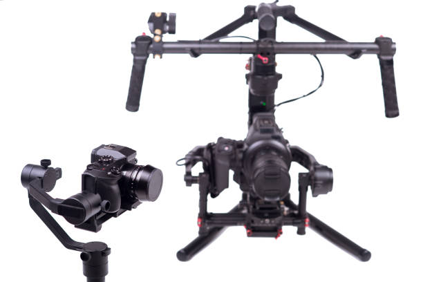 istock System stabilization video camera and lens on steady equipment support such as gimbal steady or stabilized. White background 1092130074