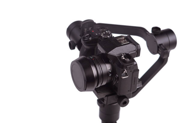 istock System stabilization video camera and lens on steady equipment support such as gimbal steady or stabilized. White background 1092130298