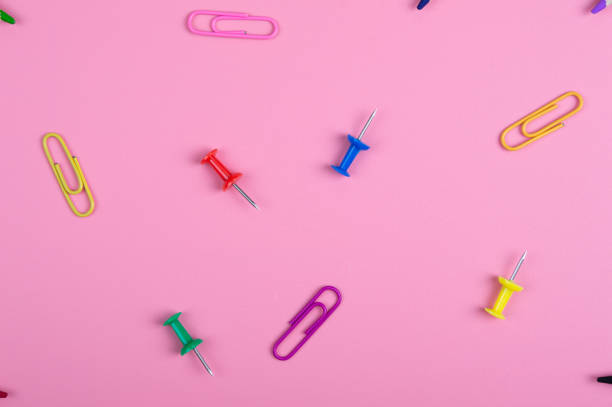 istock color clips and pins on red background 1092134312