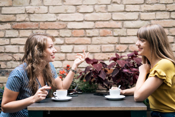 istock Relaxing women enjoying coffee together 1092137006