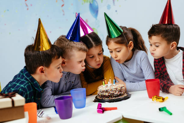 istock Blowing out birthday candles 1092138900