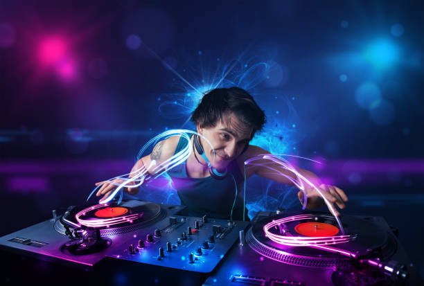 istock Disc jockey playing music with electro light effects and lights 1092140638