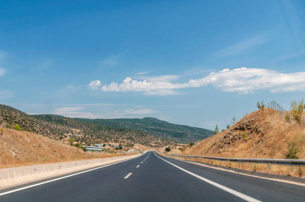 istock Highway empty road traffic street jurney with blue sky 1092153566