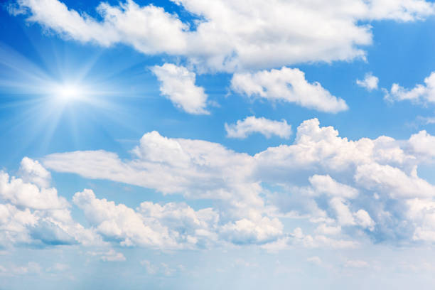 istock White fluffy clouds in the blue sky 1092154410