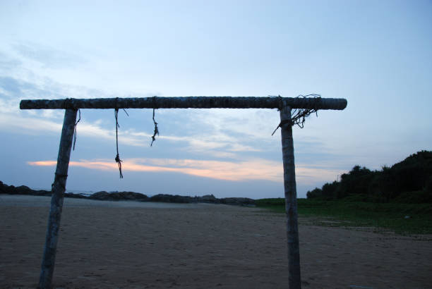 istock wooden structure on the beach sunset 1092159236
