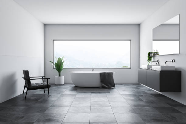 istock White bathroom interior, tub and sink 1092161436