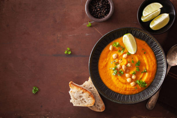 istock creamy carrot chickpea soup on dark rustic background 1092170948